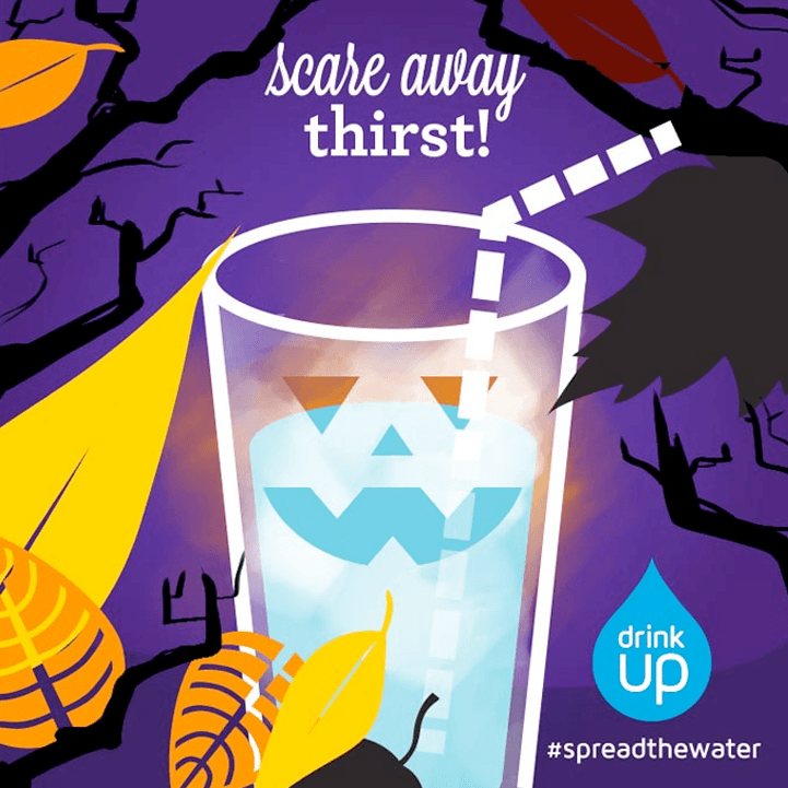 Halloween Illustration for Drink Up graphic. The glass has a Jack O'Lantern face on it. The background is spooky trees and fall leaves.
